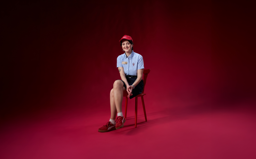 Alena sitting on a chair