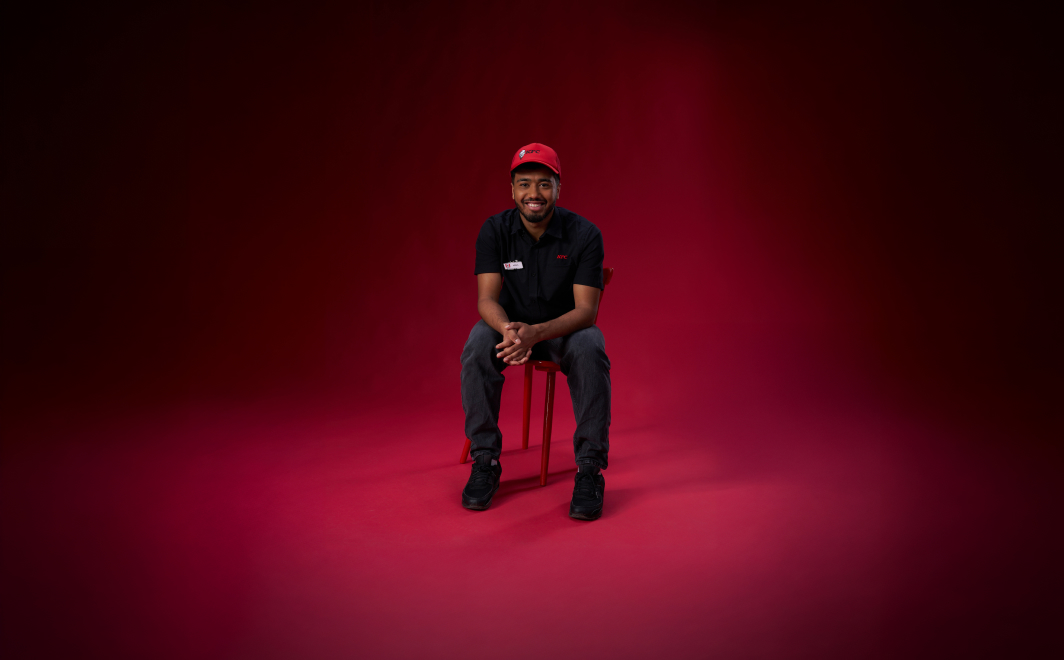 Arash sitting on a chair